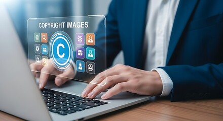 Navigating copyright A crisp blue suit accents a laptop with a vibrant digital display fingers poised for action on a