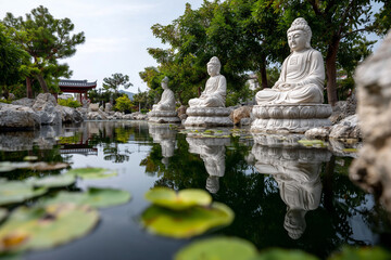 Peaceful temple garden with statues of deities and lotus pond, tranquil atmosphere, 