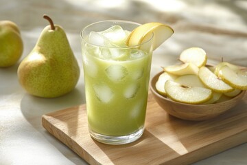 Refreshing pear smoothie in a glass with ice, accompanied by fresh pear slices.