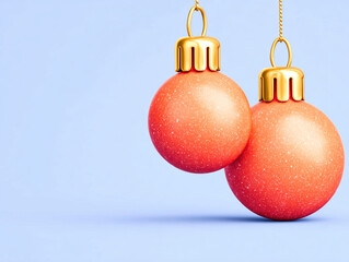 Bright holiday ornaments create cheerful atmosphere against soft blue background