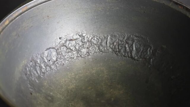 Damaged Interior of Pot Peeling, Cracking, and Bubbling of Non-Stick Coating Revealed.