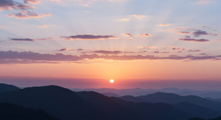 Obraz premium Serene Sunrise Over Majestic Mountain Ranges