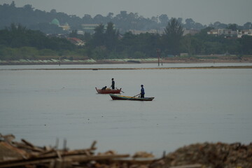 Solitary Journey: One Person, One Boat, and the Stillness of Water
