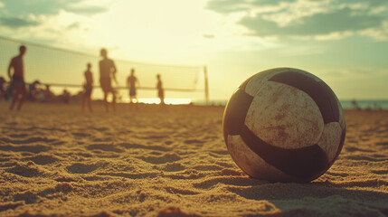 Beach soccer ball sunset game sand vacation summer sport activity lifestyle recreation leisure fun competition 100