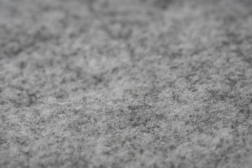 Graue Filztextur mit dichter Faserstruktur