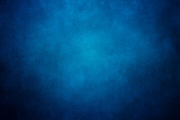 Dark blue grunge texture with a vintage aged paper pattern