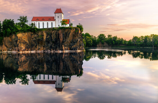 sunrise at Brandis Beucha Bergkirche Beucha mirror lake warm light church tower churchmountain germany leipzig