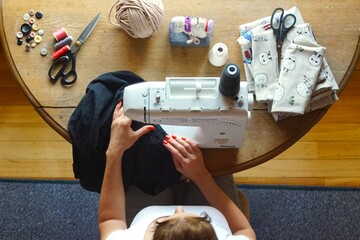 a woman doing needlework