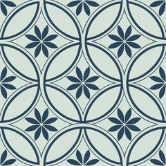Fototapeta premium Geometric floral seamless pattern in navy blue and light blue background for decor