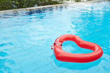 heart shaped float in the pool