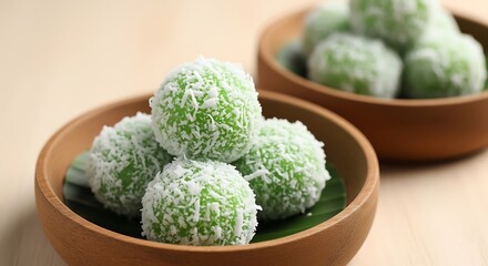 Klepon, also known as onde-onde, is indonesian traditional cake. Klepon is made from glutinous rice flour mixed with pandan juice and filled with liquid brown sugar and formed into small balls