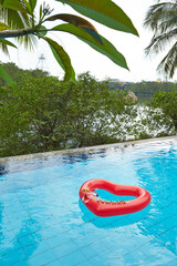 heart shaped float ,snorkeling, and summer items at the resort pool