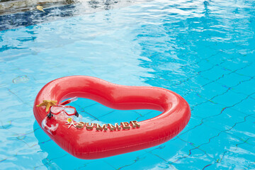 heart shaped float ,snorkeling, and summer items at the resort pool