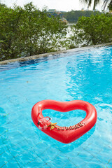 heart shaped float ,snorkeling, and summer items at the resort pool