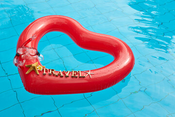 heart shaped float ,snorkeling, and summer items at the resort pool