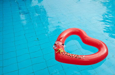 heart shaped float ,snorkeling, and summer items at the resort pool