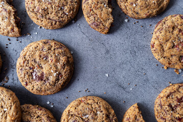 Perilla seeds chocolate chunk cookies on grey background.