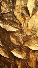Close up textured view of overlapping golden leaves with intricate vein details