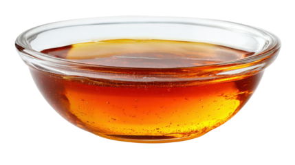 Transparent fish sauce in small glass bowl, isolated on white background