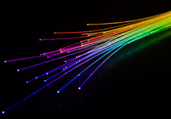Rainbow Fiber Optic Lights on Dark Background
