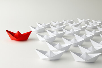 Leadership Concept with Origami Boats,Teamwork Concept,  Generative ai