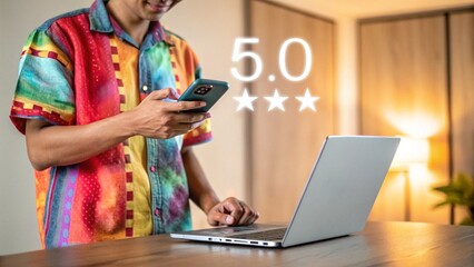 Happy User Reviewing Product with Mobile Phone and Laptop