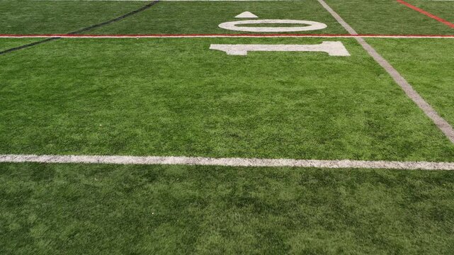 Football stadium yard lines fly over 4k