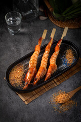 3 grilled shrimp placed on the plate
