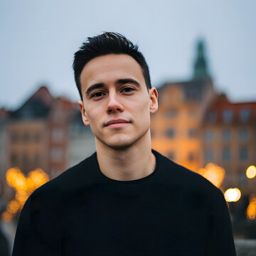 Pensive Young Man Looking Away in City