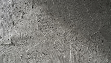 Rough Cement texture background, Concrete Wet Plastering wall Background building site, Cement mortar loft gray detail mix sand grain plaster pattern construction work site well free space for text 