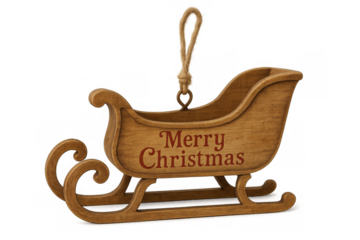 Christmas wooden sleigh ornament with merry christmas writing hanging from a rope on a transparent background