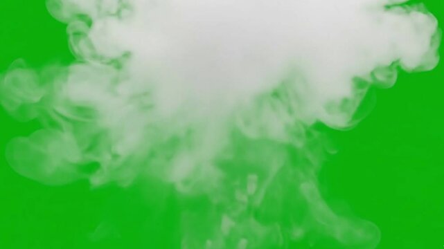 A stock image features a cloud of white smoke rising against a bright green background.