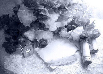 Paper with quill and flowers