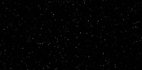 Terrazzo black background with scattered gray and white dots. Rock spatter stone marble backdrop. Black wall texture with noise overlay pattern. Vintage quartz terrazzo flooring.	