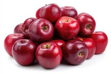 A pile of glossy, dark red apples, arranged somewhat haphazardly, sits against a stark white background.  The apples are uniformly sized and appear ripe and juicy