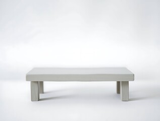 Simple White Low Table Against a Plain Background Studio Environment