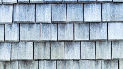 natural old woodenwall with many small wooden slats in grey color tones