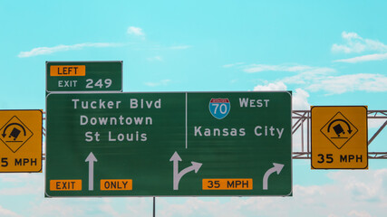 Kansas City and St Louis travel design element. Highway overhead road sign for exits and 70 west....