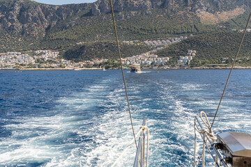 View of Kaş from the sparkling blue sea. Kaş is one of the most well-known and beautiful tourist destinations in the Mediterranean. Antalya - Turkey