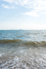 The atmosphere of the waves with a gentle breeze at Bangsaen, Chonburi, Thailand