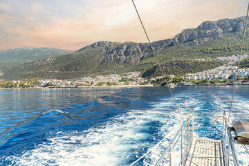 View of Kaş from the sparkling blue sea. Kaş is one of the most well-known and beautiful tourist destinations in the Mediterranean. Antalya - Turkey