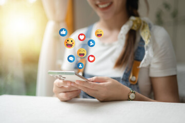 The concept of living on vacation and playing social media. Social media and digital online concept, man using smart phone with Social media. Social Distancing ,Working From Home concept..