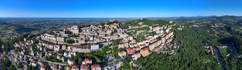 Obraz premium Aerial view of San Marino also known as the Most Serene Republic of San Marino an enclaved microstate surrounded by Italy, situated on the Italian Peninsula on the northeastern side of the Apennines