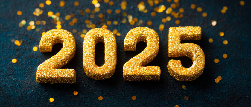 Golden 2025 numerals on a dark blue background surrounded by celebratory gold glitter showing the coming New Year 2025, new, year, celebration, gold, golden, glitter, number, numeral, confetti, dark, 