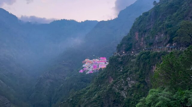 view of Vaishno Devi Shrine in India, clouds over the mountains in Jammu hills at Vaishno Devi shrine, Temple in Jammu