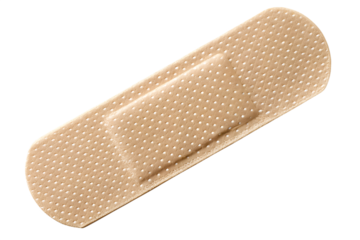A single beige fabric bandage with white dots isolated on transparent background