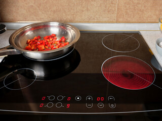 Top view of control panel turned on of modern electric cooking stove.