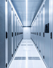 Clean, hightech data center aisle with rows of servers. Illustrates technology, security, data storage, and connectivity. Great for tech articles  website backgrounds.