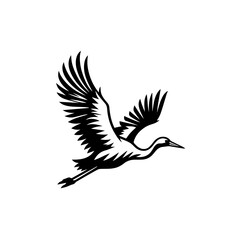 Fototapeta premium Silhouette of a graceful stork in flight wings spread wide soaring.