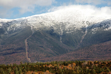 Cog Railway tracks and Mount Washington in New Hampshire's scenic White Mountains. Trains can be...